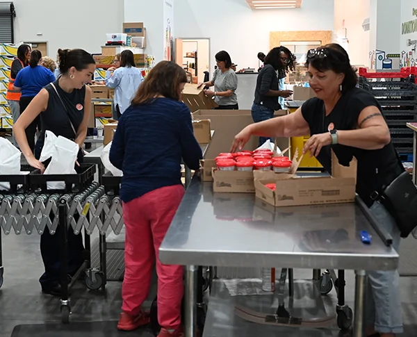 Photo of Sands Anderson staff volunteering at FeedMore